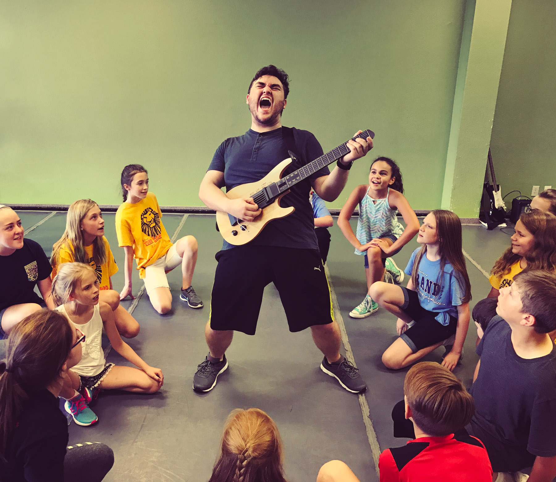 Jonathan McInnis as Dewey Finn in School of Rock at The Acting Studio - Rehearsal Picture